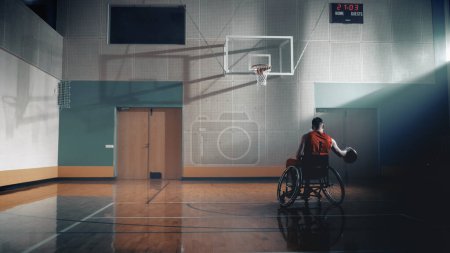 Photo for Wheelchair Basketball Player Dribbling Ball Like a Professional, Ready to Shoot. Depressive Mood, Concept of Sadness, Gray Colors Person with - Royalty Free Image