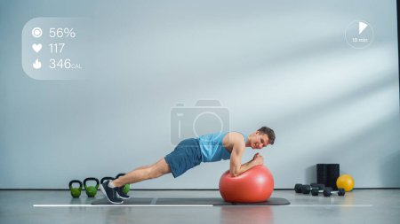 Online Fitness Course Video with Young Athletic Personal Trainer Explaining Core Strengthening Workout with Plank Position on a Ball. Fit Man Showing