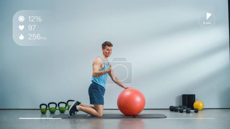 Fitness Course Video with Young Athletic Personal Trainer Explaining Core Strengthening Workout with Plank Position on a Ball. Fit Man Showing How to