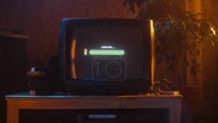 Close Up Footage of a Retro TV Set Screen with an Eight Bit Eighties Inspired Console Arcade Video Game. Quest Loading, Player Waiting to Start New