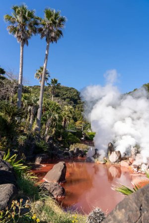 Photo for A pond of boiling, red water at Umi Jigoku in Beppu, Japan - Royalty Free Image