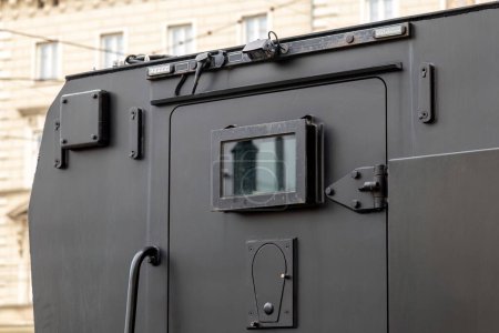 Photo for Armored vehicle car truck back door detail, jail prison van, money valuables transport prisoner transportation special operations heavily armored military vehicles simple conceptual symbol closed door - Royalty Free Image