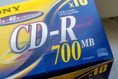 Photo for Sony CD-R 700 MB Compact Disc Recordable Enregistrable disc pack, package full of CD compact optical data storage CD-ROM standard cdr discs, closeup detail, nobody - Royalty Free Image