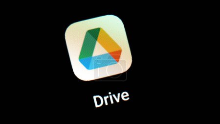Photo for A close-up of the Google Drive app icon on a mobile device smartphone screen display. Cloud storage and file sharing Google only service simple concept, nobody - Royalty Free Image