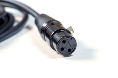 Sharp close-up shot of a three-pin XLR audio cable connector commonly used in professional audio equipment, isolated on a white background, cable end up close shot, nobody, shallow DOF