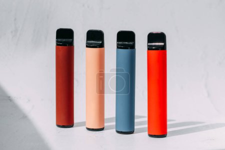 Multicolored multi-use electronic vape cigarettes.