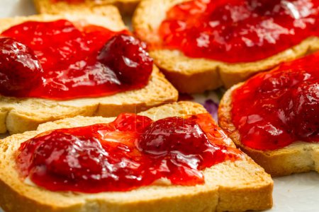Photo for Toasted bread and jam on plate. - Royalty Free Image
