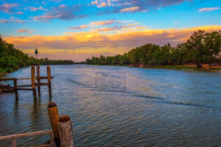 Photo for Colorful sunset over Murray river in Mildura, Australia. The Murray River is one of Australias longest and most significant rivers, stretching from the Australian Alps to the Southern Ocean. - Royalty Free Image
