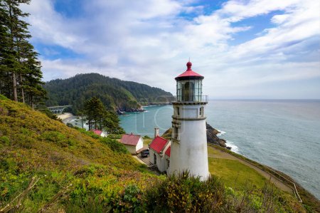 Photo for Heceta Head Lighthouse located along the scenic Oregon coast. It is a stunningly picturesque and historic beacon set atop a rugged cliff, offering views of Pacific Ocean and surrounding landscapes. - Royalty Free Image