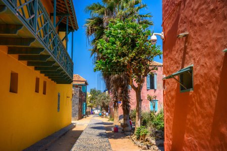 Goree Islands colorful buildings and sandy streets in Senegal, West Africa. Goree Island is known for its historical significance as a center of the transatlantic slave trade.