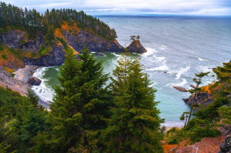Samuel H. Boardman State Scenic Corridor with rugged cliffs and forest in Oregon, USA, offering a glimpse into Oregons natural beauty.