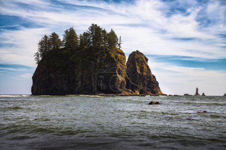 Sea stacks and rocky shoreline at La Push, Second Beach with forested outcrop in Washington State