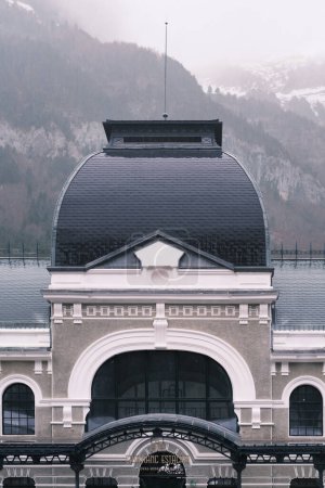 Photo for Canfranc, Spain; January 2023. Vertical picture of new hotel located in ancient train international station of Canfranc, Huesca. The building is finishing the renovation work. Historical landmark - Royalty Free Image