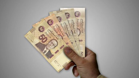 Foto de Túnez Dinar pila de dinero en la mano 3d ilustración. Concepto de fondo de los billetes TND: finanzas, crisis económica, inflación y negocios. - Imagen libre de derechos
