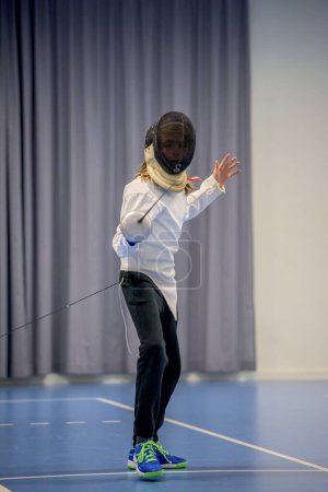 Photo for Gothenburg, Sweden - January 28 2018: A young fencer with a foil.. - Royalty Free Image