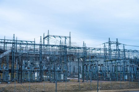 Photo for Larger transformer station converting high voltage. - Royalty Free Image