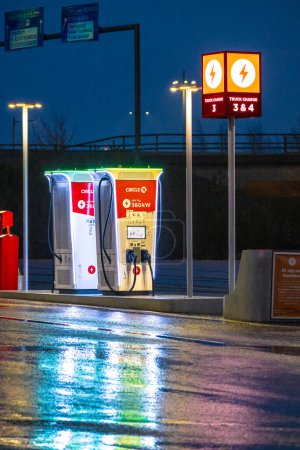 Photo for Gothenburg, Sweden - February 29 2024: Powerful electric vehicle fast DC charger at a CircleK energy station. - Royalty Free Image