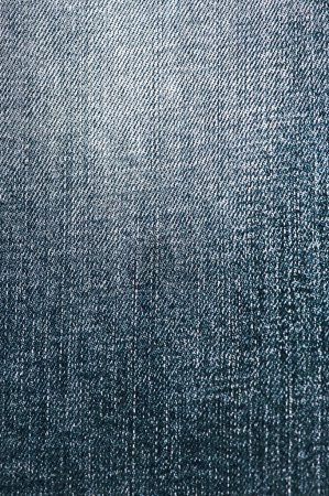Photo for Blue jeans with transition from light to dark vertical photo - Royalty Free Image