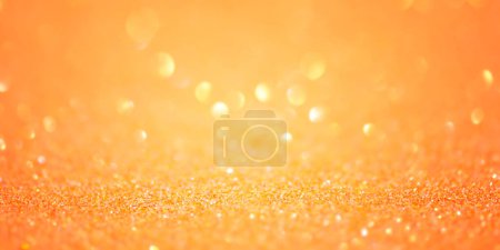 Photo for Banner background size. Defocus lights are yellow and orange. Glitter. - Royalty Free Image