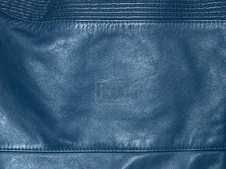Photo for Blue natural dyed leather with seams as a background. A piece of leather clothing - Royalty Free Image