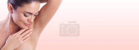 Photo for Close up of woman showing her smooth armpit. - Royalty Free Image