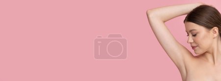 Photo for A beautiful model shows her depilated armpits. - Royalty Free Image