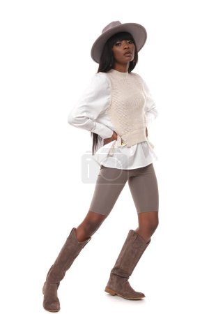 Photo for A fashionable African American woman in a fashionable outfit. - Royalty Free Image