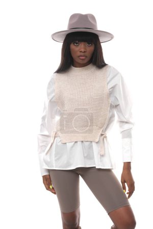 Photo for A fashionable African American woman in a fashionable outfit. - Royalty Free Image