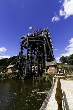 Photo for ANDERTON, ENGLAND  JUN 11  2022 View of the Anderton Boat Lift, vertically linking the River Weaver and the Trent and Mersey Canal, wide angle, portrait - Royalty Free Image