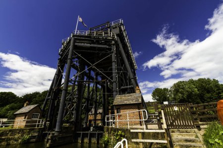 Photo for ANDERTON, ENGLAND  JUN 11  2022 View of the Anderton Boat Lift, vertically linking the River Weaver and the Trent and Mersey Canal, wide angle, landscape, close up - Royalty Free Image