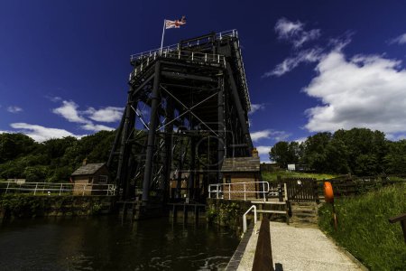 Photo for ANDERTON, ENGLAND  JUN 11  2022 View of the Anderton Boat Lift, vertically linking the River Weaver and the Trent and Mersey Canal, wide angle, landscape - Royalty Free Image