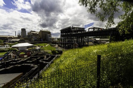 Photo for ANDERTON, ENGLAND  JUN 11  2022 View of the Anderton Boat Lift, vertically linking the River Weaver and the Trent and Mersey Canal, wide angle, landscape, rear view showing whole structure - Royalty Free Image