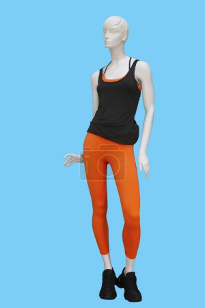 Full length image of a female display mannequin wearing black sleeveless T-shirt and red tight trousers isolated on blue background