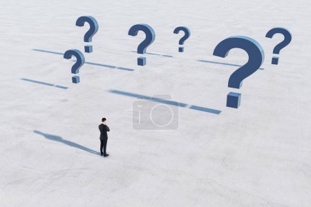 Photo for Doubt and fear concept with businessman back view on empty concrete field in front of blue question marks - Royalty Free Image