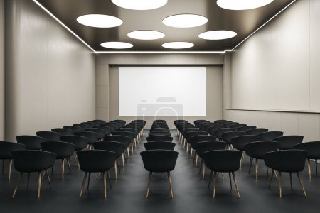 Front view on blank white screen with place for your logo or text on light beige wall in empty auditorium with round lights on top and black seat rows. 3D rendering, mock up