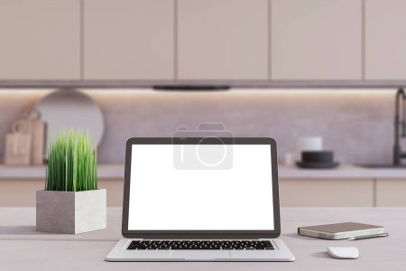 Fond de cuisine moderne avec un ordinateur portable avec un écran blanc sur une table, idéal pour une maquette ou une présentation de site Web. Rendu 3D