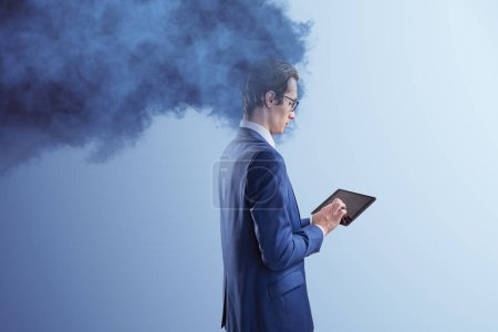 Photo for Head in the clouds concept. Cloud head attractive european man using tablet on light background. Work trouble - Royalty Free Image