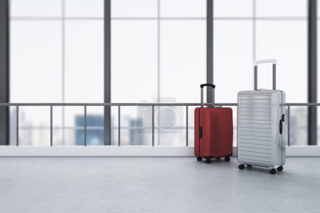 Red and gray suitcases placed in clean blurry airport interior with panoramic windows and city view. Travel and luggage concept. 3D Rendering