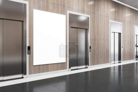 Perspective view on blank white poster with place for advertising text or logo brand between steel elevators in modern business center corridor hall with wooden wall background. 3D rendering, mockup