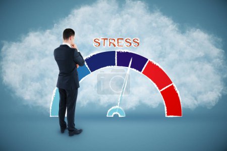 Attractive young busiessman with rising stress level scale on abstract blue background with cloud. How to reduce stress levels concept