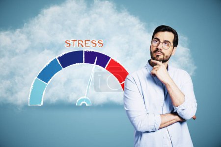 Attractive young busiess an with rising stress level scale on abstract blue background with cloud. How to reduce stress levels concept