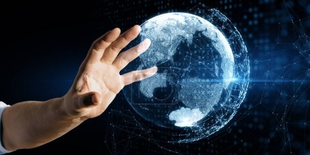 Close up of male hands holding glowing blue polygonal globe hologram on dark background