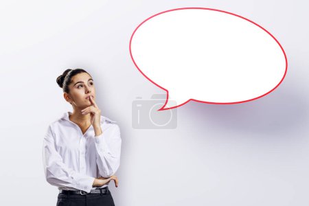 Photo for Attractive young european woman with speech bubble on white background. Opinion, speech and communication concept. Mock up place - Royalty Free Image