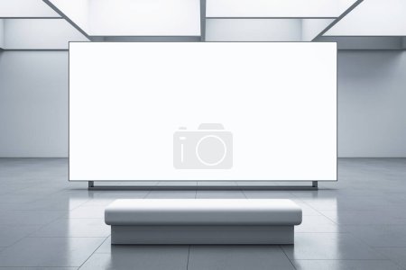 Foto de Vista frontal en gran pantalla de televisión en blanco con espacio para cartel publicitario o marco de imagen o campaña en el interior abstracto de la sala de exposiciones con piso de hormigón en el fondo. Representación 3D, maqueta - Imagen libre de derechos