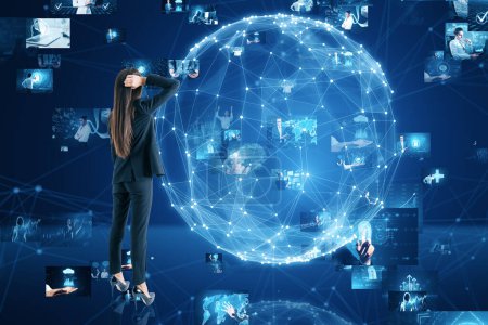 Connecting businesspeople, video conference concept. Back view of thoughtful young european businesswoman looking at abstract blue globe with polygonal mesh and images on blurry background