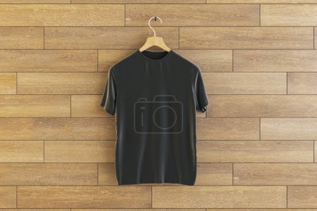 Téléchargez les photos : Empty black t-shirt hanging on wooden wall background. Ad, textile and fashion concept. 3D Rendering - en image libre de droit