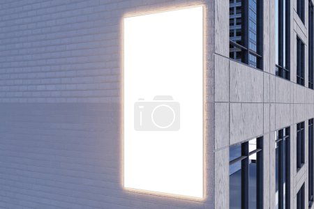 Cartelera blanca iluminada con el lugar de la maqueta para el anuncio en exterior moderno del edificio. Renderizado 3D