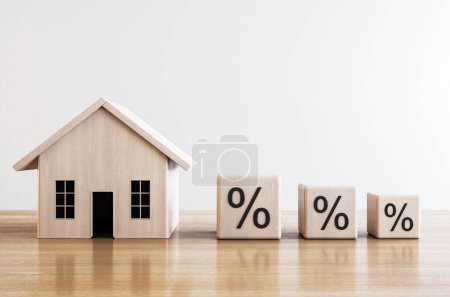 Wooden house model with percentage blocks, illustrating mortgage and finance concept. 3D Render