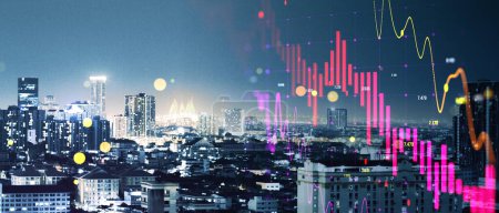 Abstract wide night city background with falling forex chart. Crisis, finance and trade concept. Double exposure