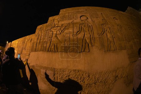 Photo for Kom Ombo, Aswan, Egypt  - December 24, 2022 - Tourists visit to The Temple of Kom Ombo, an unusual double temple dedicated to the crocodile god Sobek and the falcon god Haroeris (Horus the Elder) - Royalty Free Image